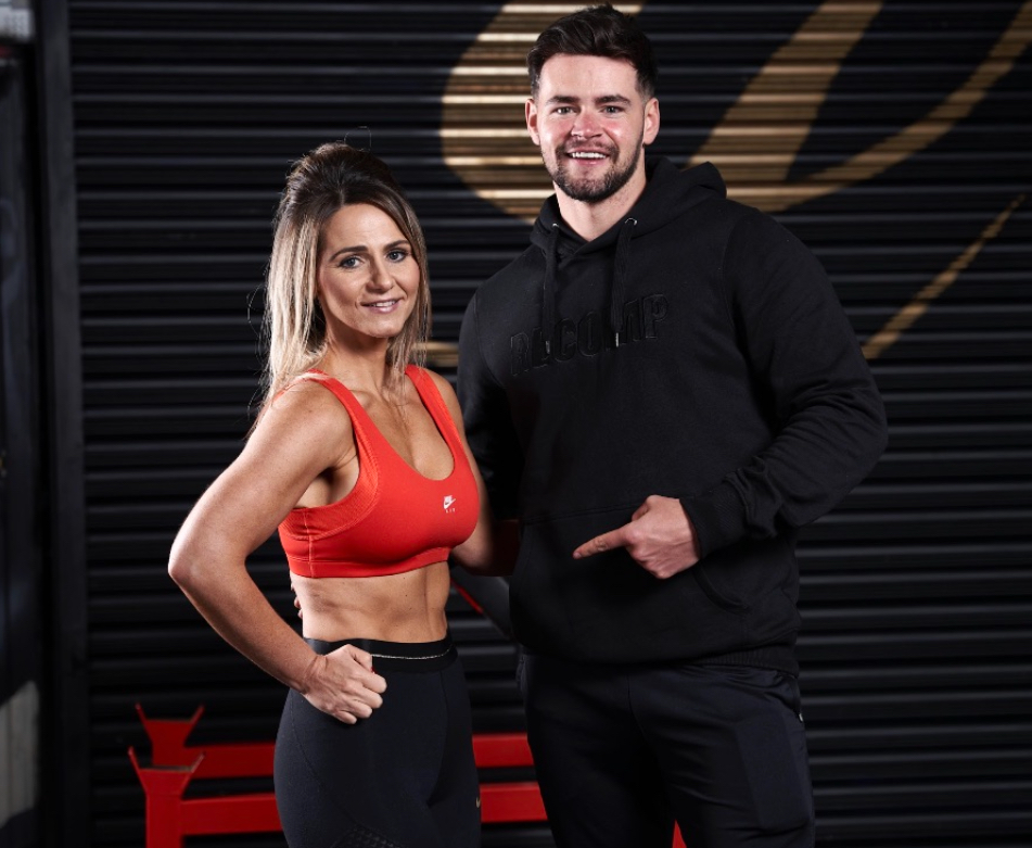Kevin, founder of Recomp Online, with a client at the Recomp Online gym